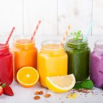 Smoothies, juices, beverages, drinks variety with fresh fruits a